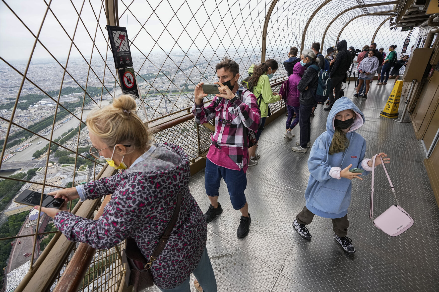 APTOPIX Virus Outbreak France Eiffel Tower